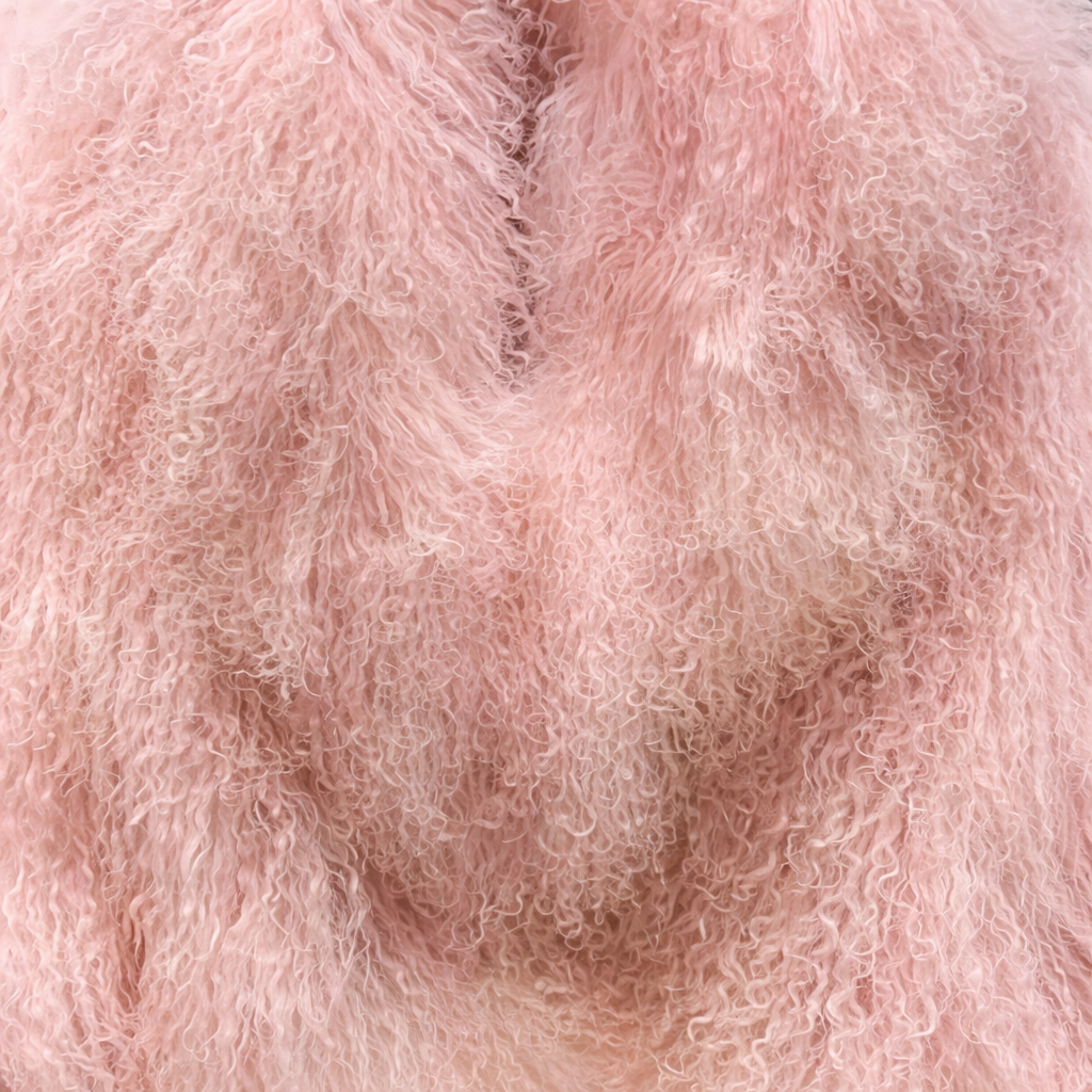 Close-up of Light Pink Mongolian fur coat showing dense curly shearling texture – UK women’s winter outerwear