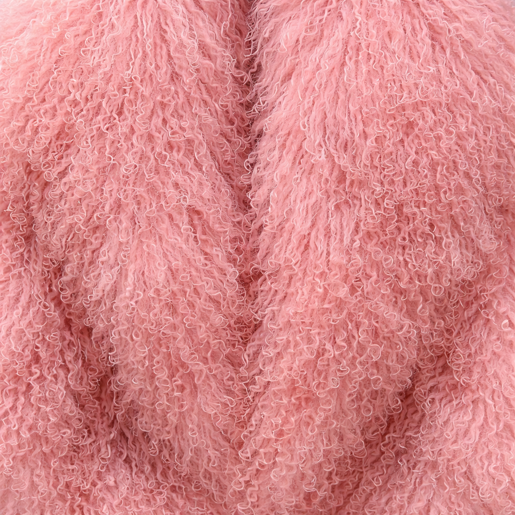 Close-up of Rose Pink Mongolian fur coat showing dense curly shearling texture – UK women’s winter outerwear