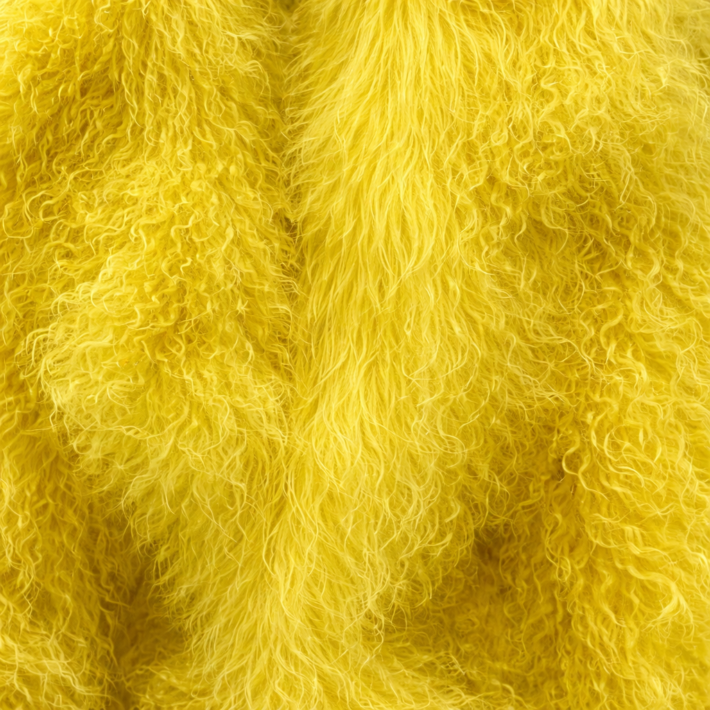 Close-up of yellow Mongolian fur coat showing dense curly shearling texture – UK women’s winter outerwear
